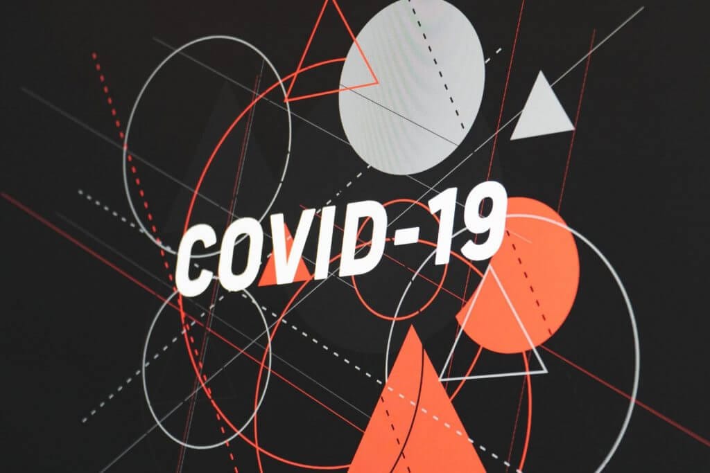 'COVID-19' written on an Illustrated background